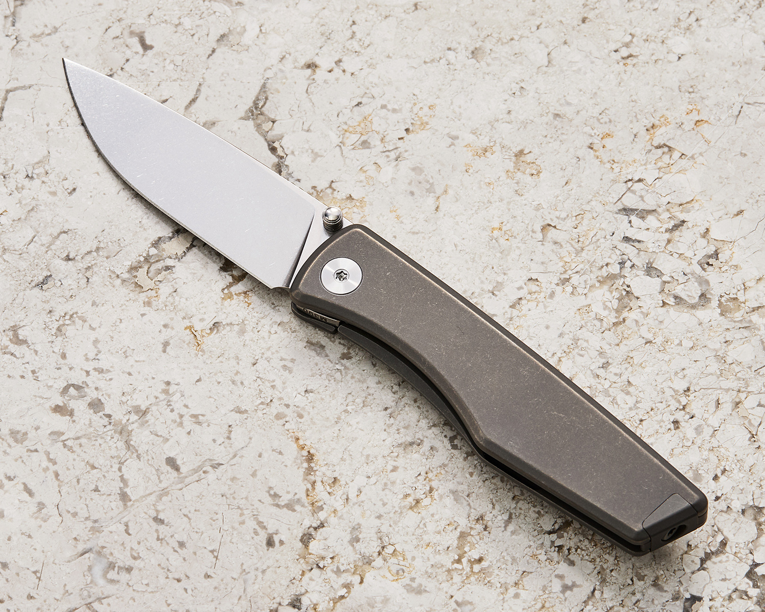 BIGiDESIGN The Overlook folding knife open on marbled background