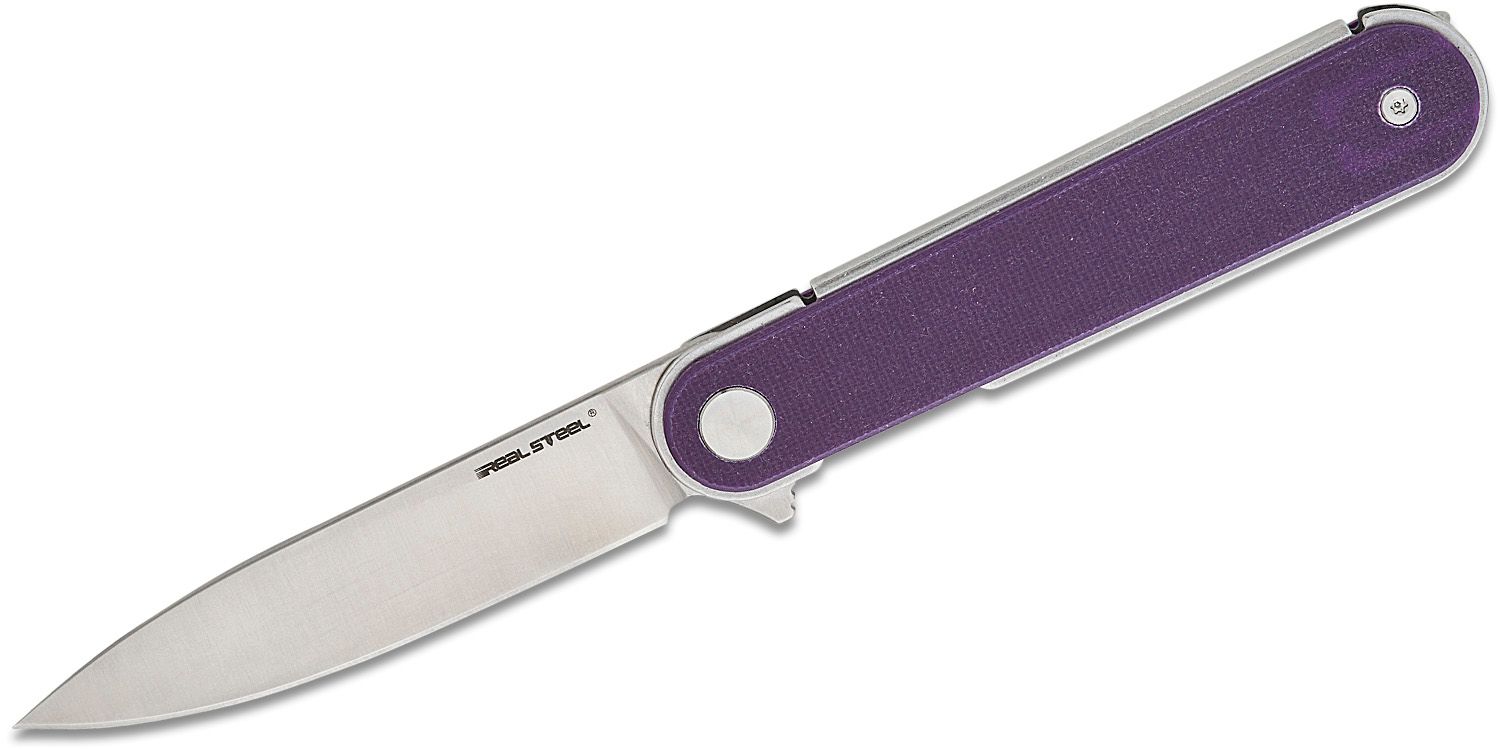 Real Steel Iris folding knife open on white background