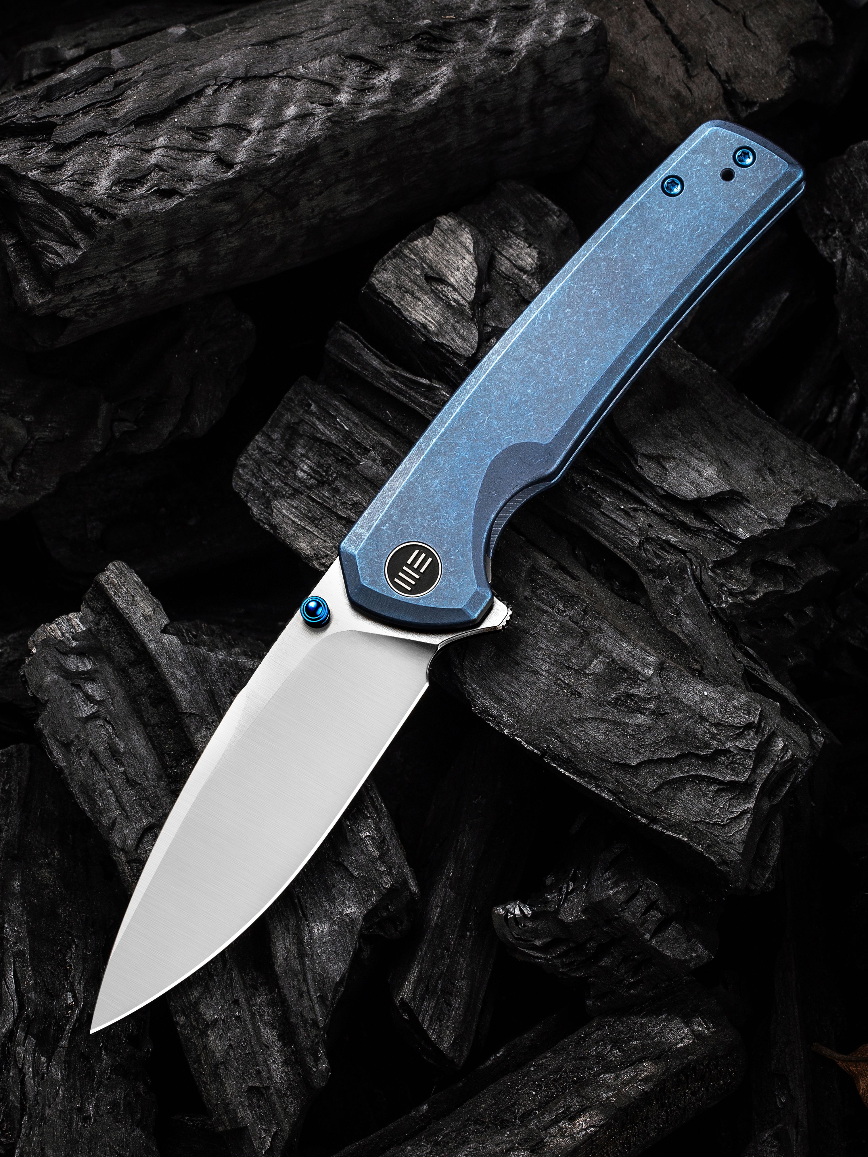 We Knife Company Equivik Nested Frame Lock Flipper Knife 3.48 CPM-20CV  Hand Rubbed Satin Drop Point Blade, Blue Titanium Handles with Polished  Bead Blasted Titanium Scales - KnifeCenter - WE23020-3