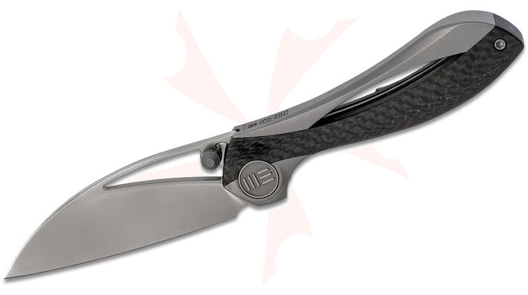 We Knife Company 821A Elijah Isham Pleroma Folding Knife 2.95 inch M390 Wharncliffe Blade, Integral Titanium Handle with Carbon Fiber Inlays